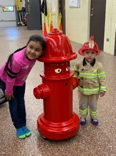 Children with fire engine